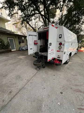 Magnet Plumbing service vehicle on-site for Grease Trap Cleaning in Huntington Terrace
